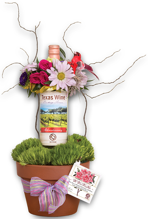 Flower pot with bottle of wine and bouquet of flowers